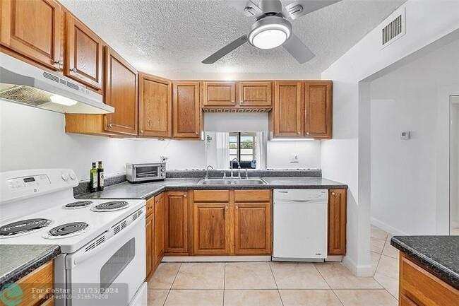 2800 Somerset Drive # J, Lauderdale Lakes FL 33311