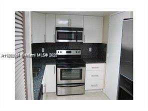301 Golden Isles Dr # 211, Hallandale Beach FL 33009