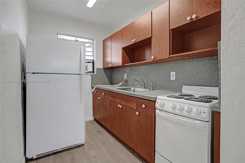 14100 NW 24th Ct # 302, Opa-Locka FL 33054