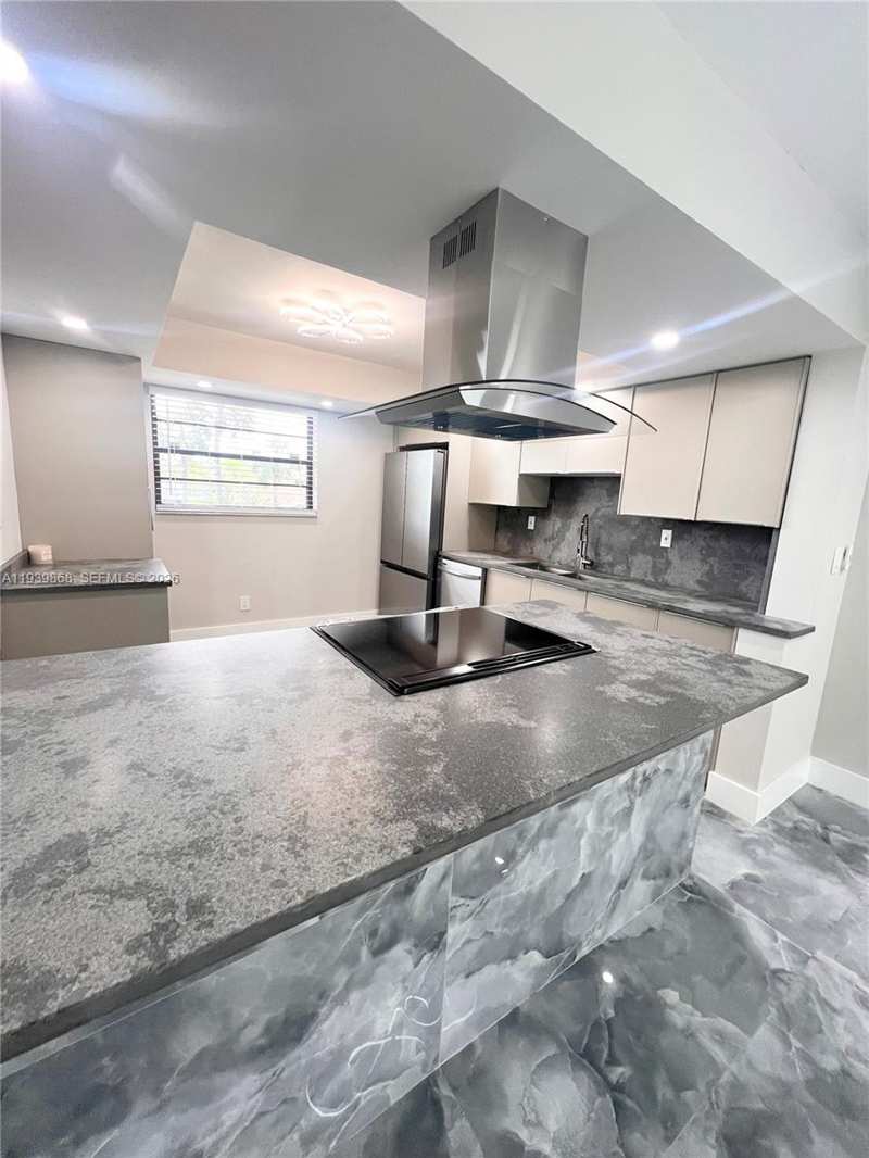 4930 E Sabal Palm Blvd # 206, Tamarac FL 33319