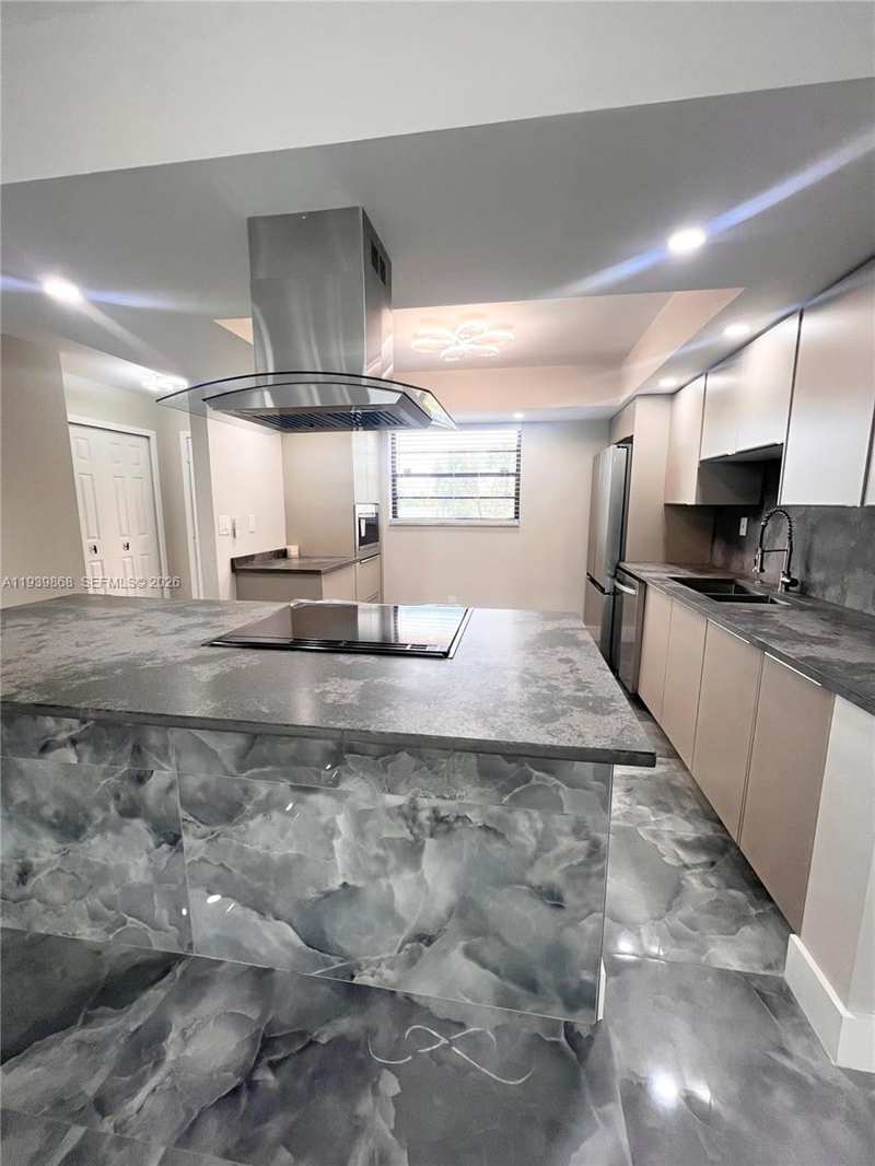 4930 E Sabal Palm Blvd # 206, Tamarac FL 33319
