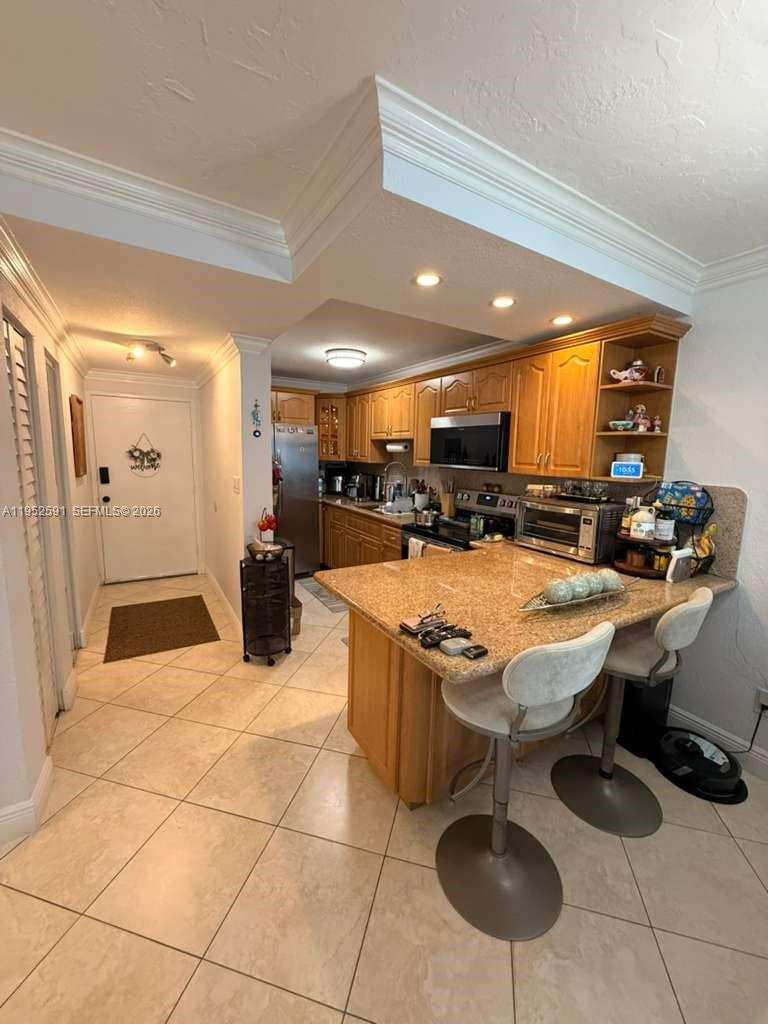 5501 NW 7th St # E207, Miami FL 33126