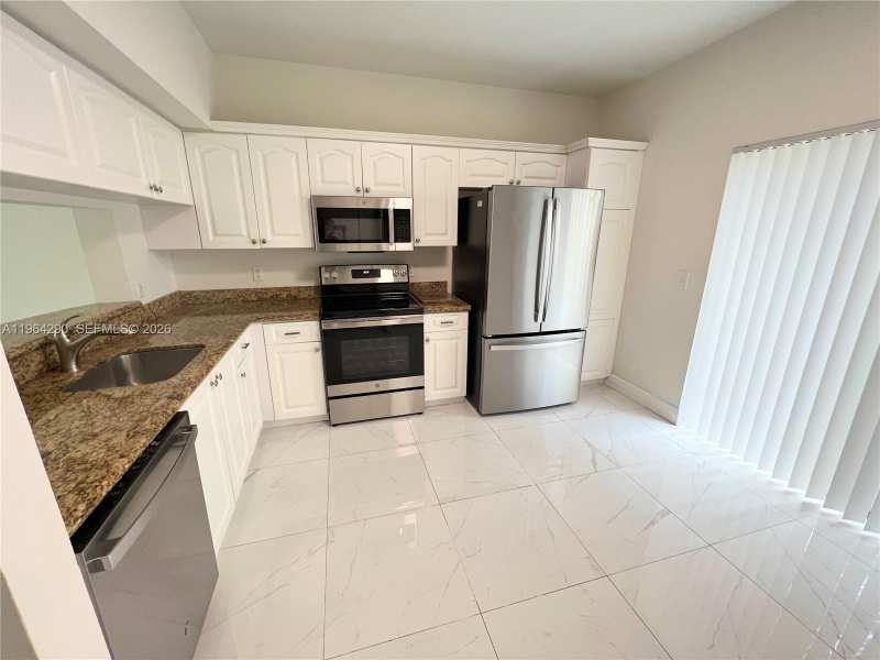9820 NW 56th Pl, Coral Springs FL 33076