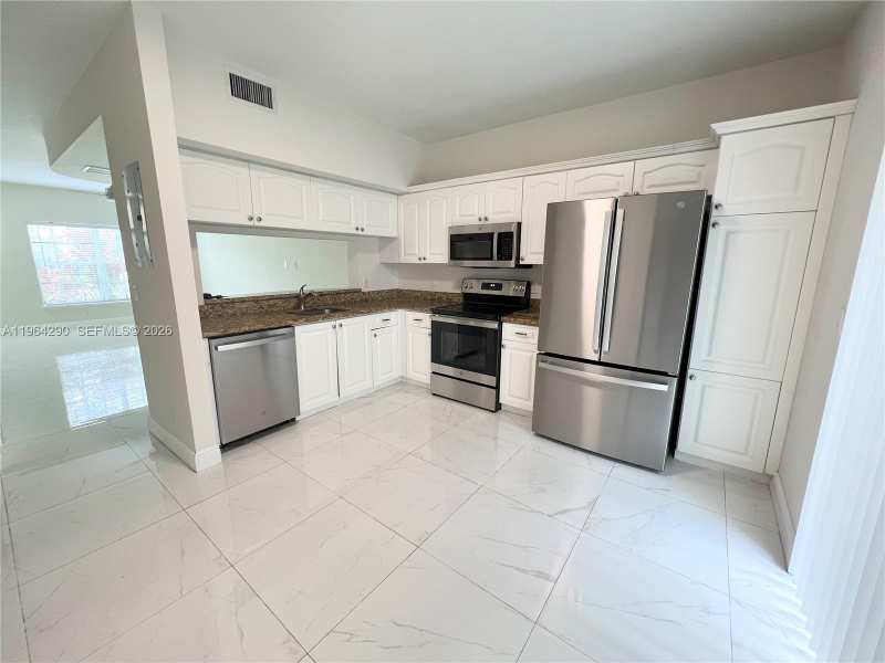 9820 NW 56th Pl, Coral Springs FL 33076