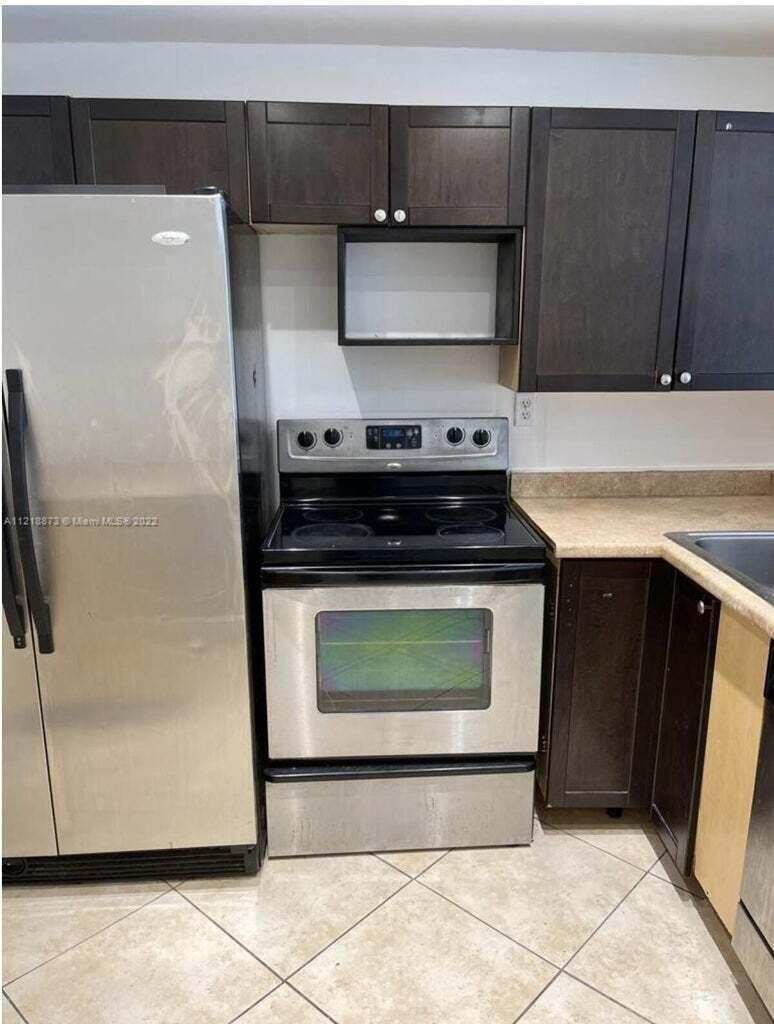 484 NW 165th St Road # 211, Miami FL 33169