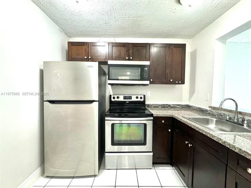 484 NW 165th St Rd # 411, Miami FL 33169