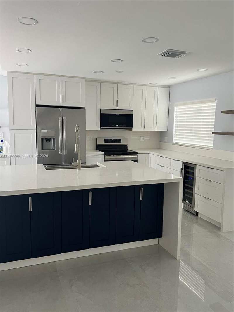 TAMIAMI LAKES SEC 7