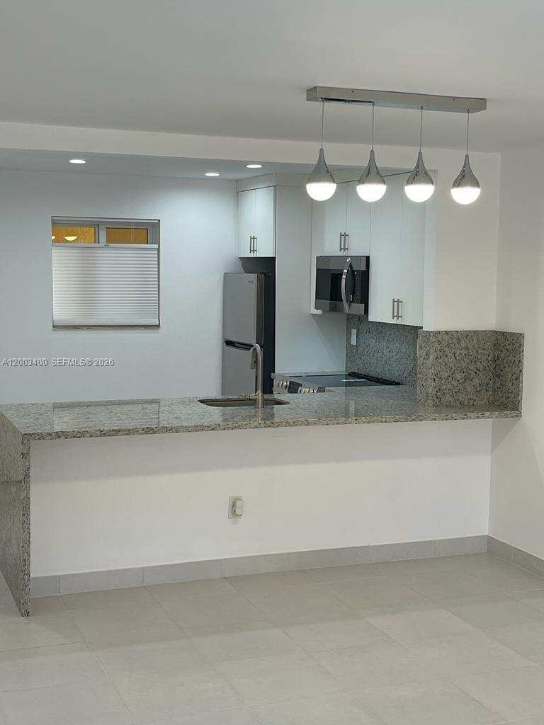 7732 Camino Real # 318, Miami FL 33143