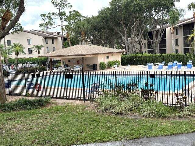 202 Foxtail Drive # F1, FL 33415