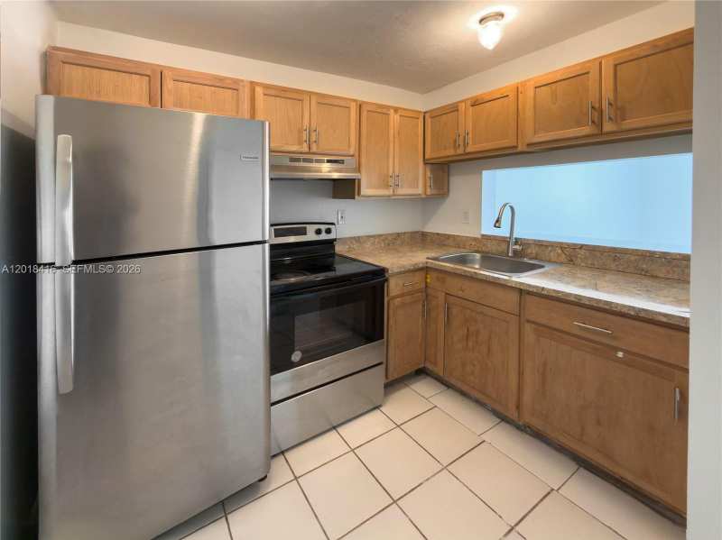 496 NW 165th St Rd # 410, Miami FL 33169