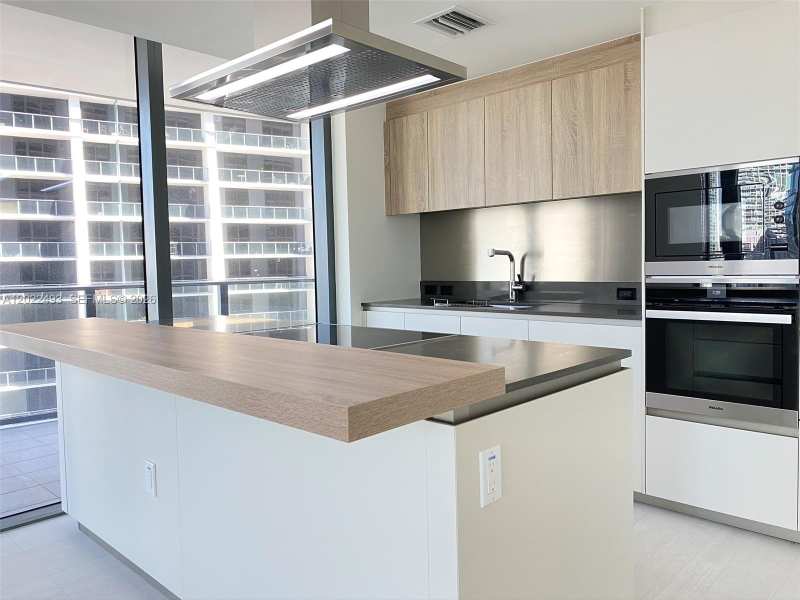 1000 Brickell Plz # 2715, Miami FL 33131
