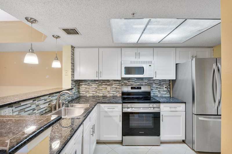 5011 Wiles Road Unit 303, Coconut Creek FL 33073