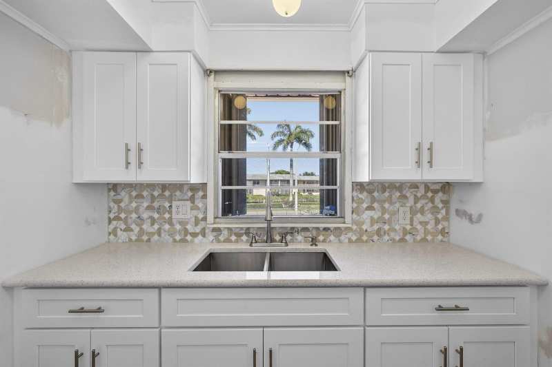 1 Golfs Edge # F, West Palm Beach FL 33417