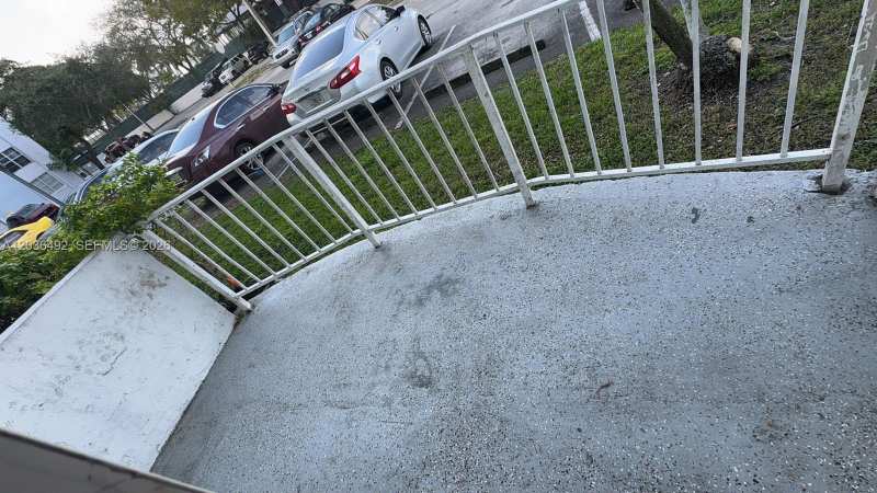 486 NW 165th St Rd # 103, Miami FL 33169