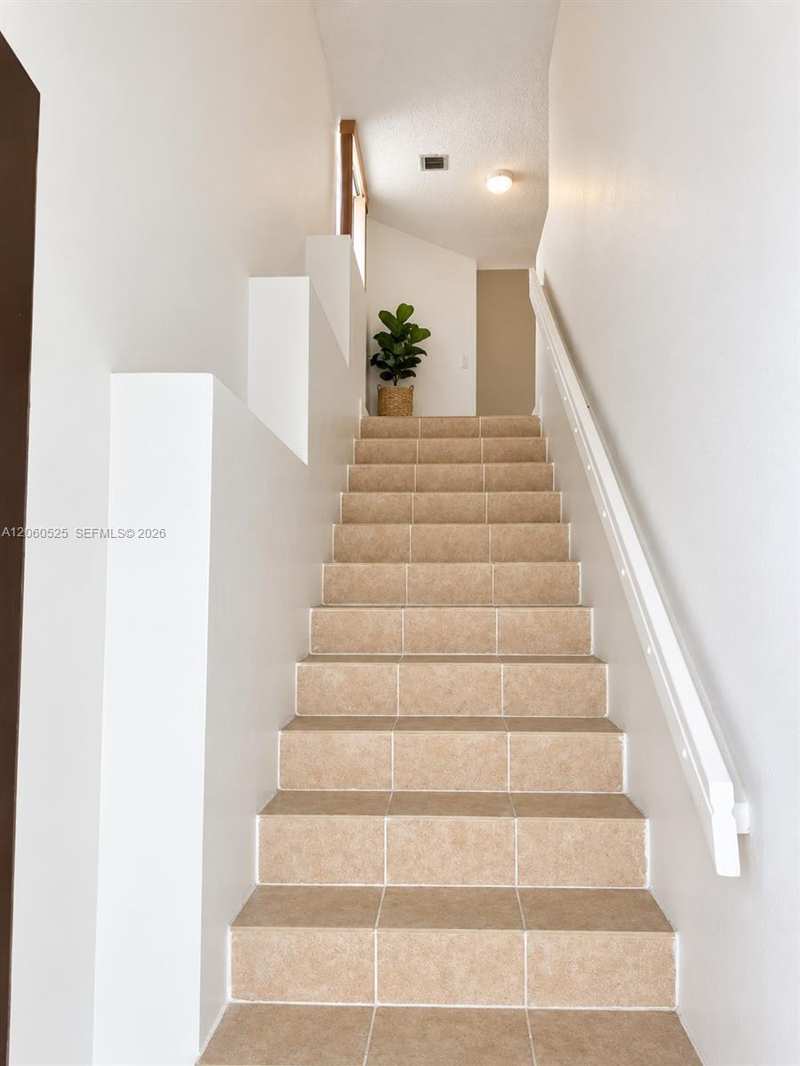 THE GREENS AT DORAL CONDO