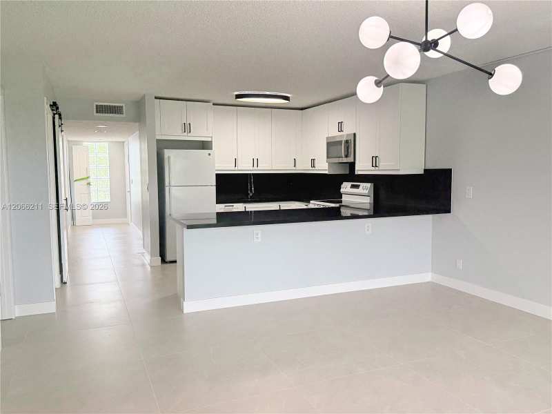 16511 Blatt Blvd # 203, Weston FL 33326