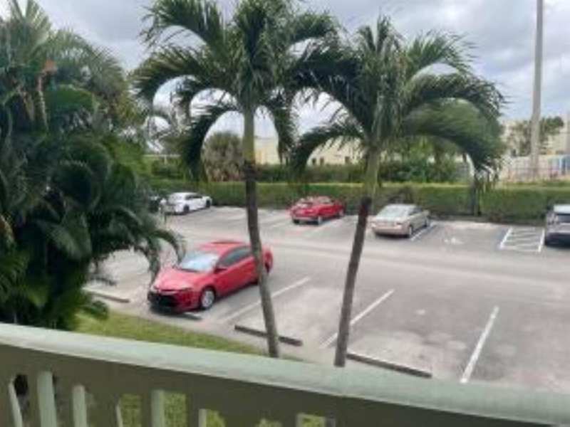400 Village Green Circle W # 202, Palm Springs FL 33461
