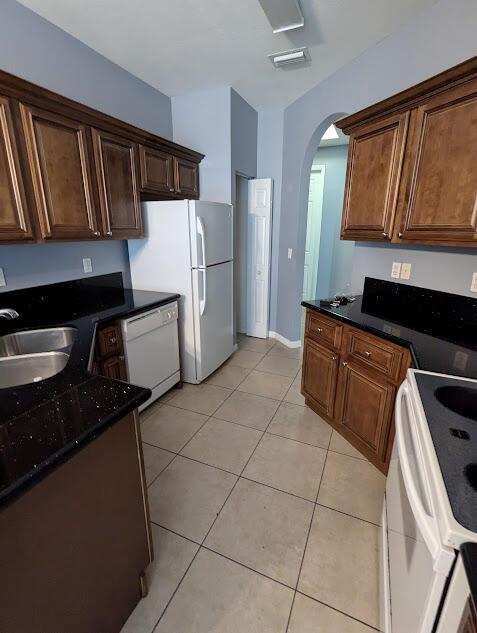 999 Pipers Cay Drive, West Palm Beach FL 33415