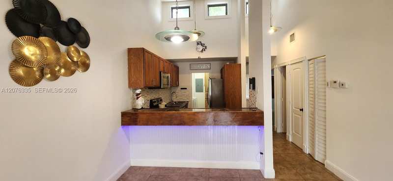 WOODSCAPE TOWNHOMES CONDO