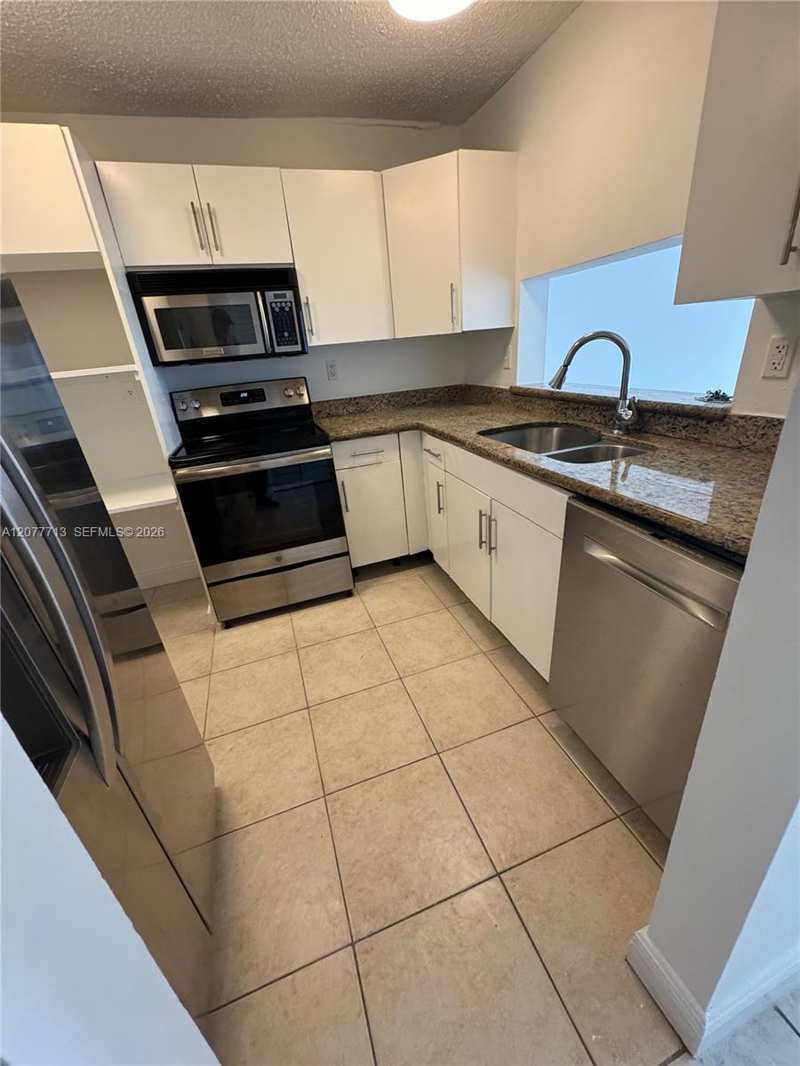 488 NW 165th St Rd # 412, Miami FL 33169