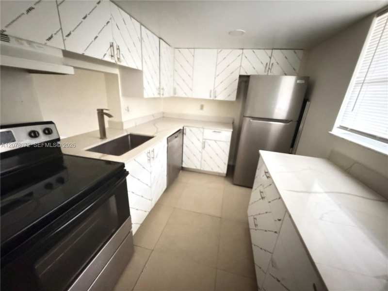 2800 NW 56th Ave # B201, Lauderhill FL 33313