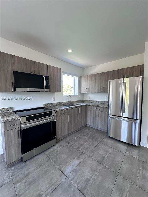 165 NW 39th St # 3, Miami FL 33127