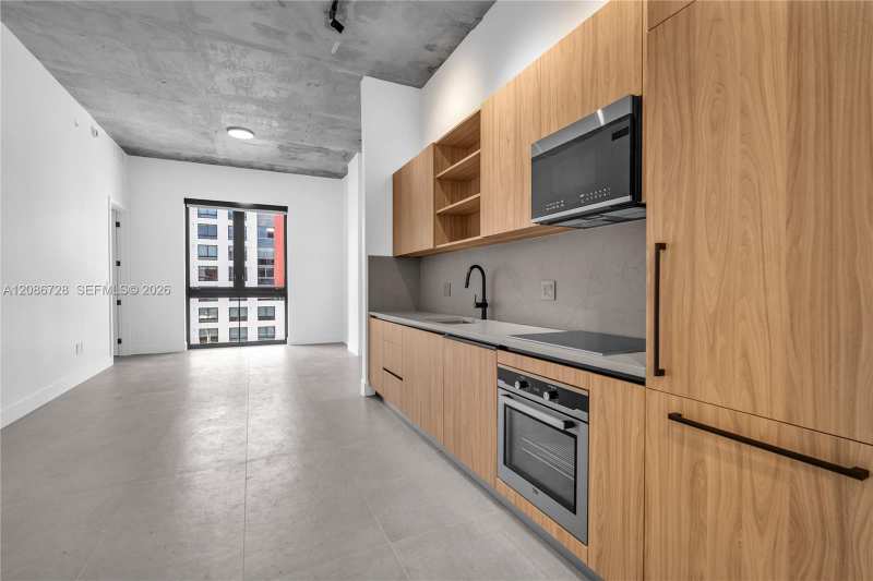 91 NW 27th St # 403, Miami FL 33127