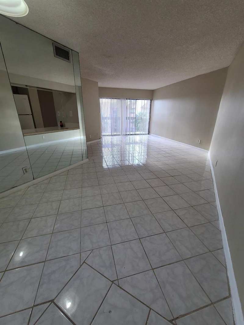 1880 N CONGRESS Avenue # 409, West Palm Beach FL 33401