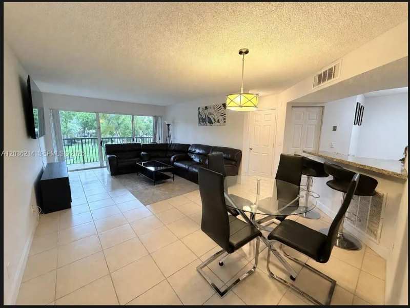 8741 Wiles Rd # 204, Coral Springs FL 33067
