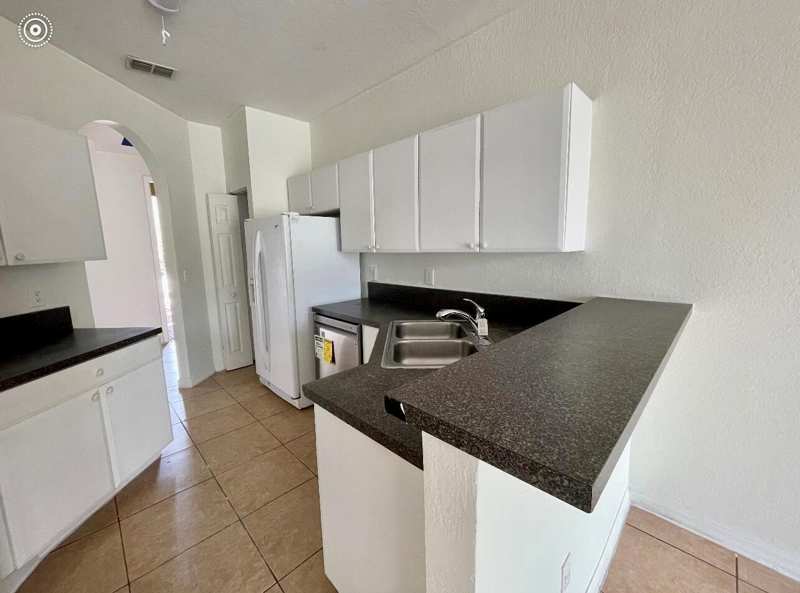 880 Pipers Cay Drive, West Palm Beach FL 33415