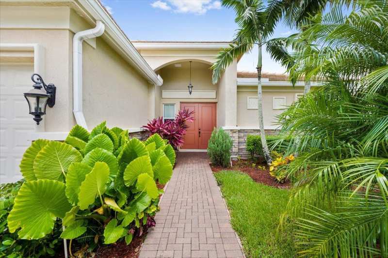 8152 Butler Greenwood Drive, Royal Palm Beach FL 33411