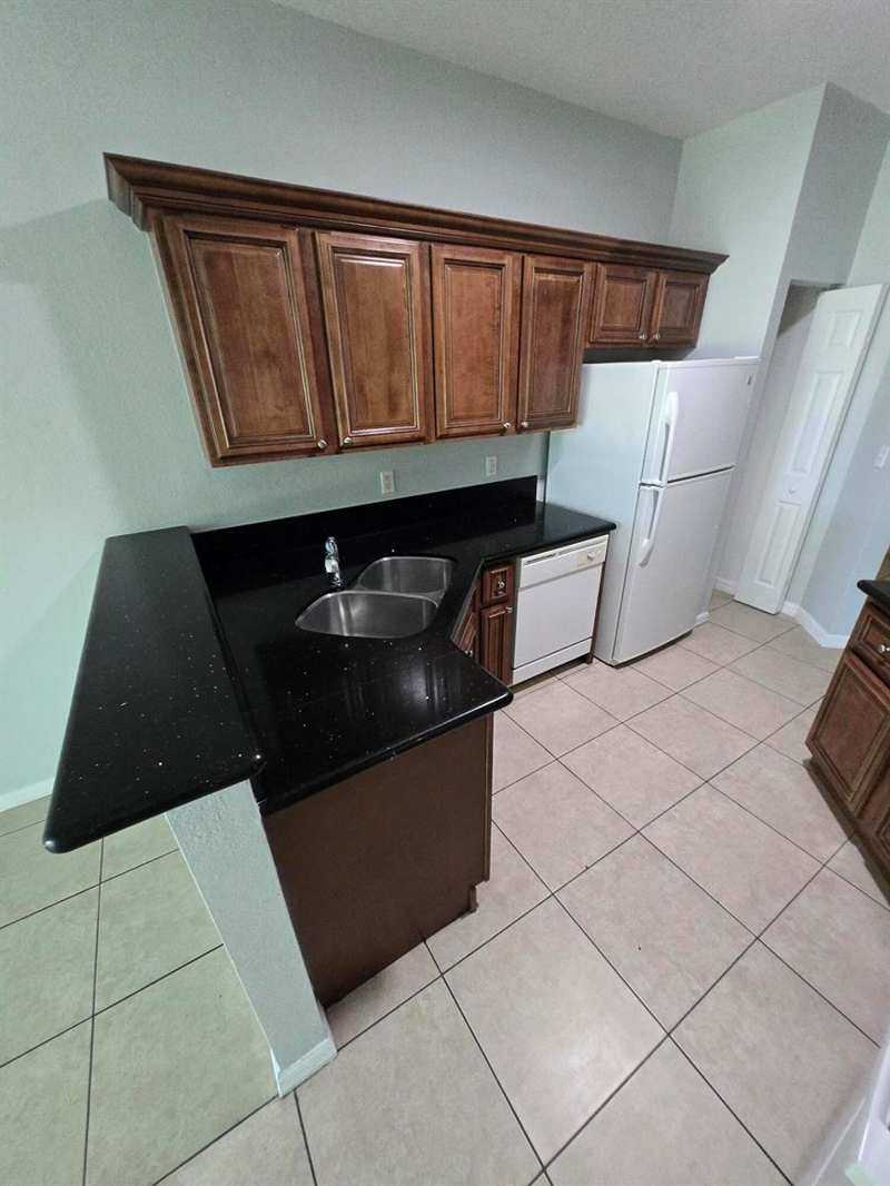 999 Pipers Cay Drive, West Palm Beach FL 33415