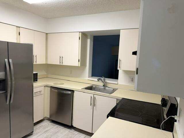 2209 S CYPRESS BEND Drive # 104, Pompano Beach FL 33069