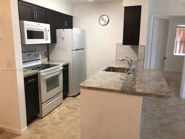 700 NW 103rd Ter # 101, Pembroke Pines FL 33026